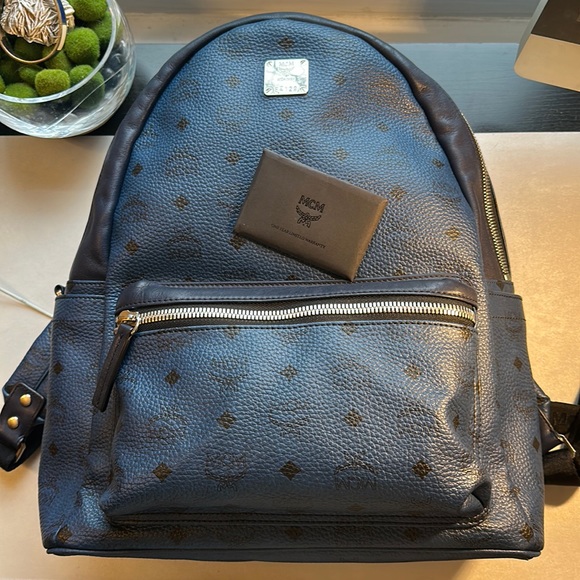 MCM Handbags - MCM blue leather Stark backpack. In excellent condition. Made for Bloomingdales
